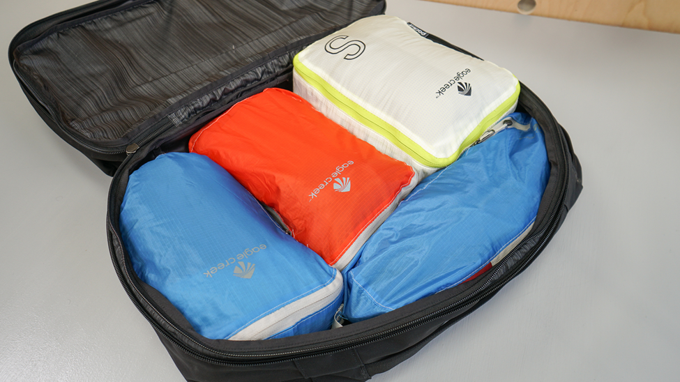 
"Packing Cube Strategy: A method for organizing and maximizing luggage space using packing cubes, categorizing items by type, and ensuring easy access for efficient and stress-free travel."